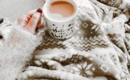 woman managing seasonal affective disorder with hot coco.